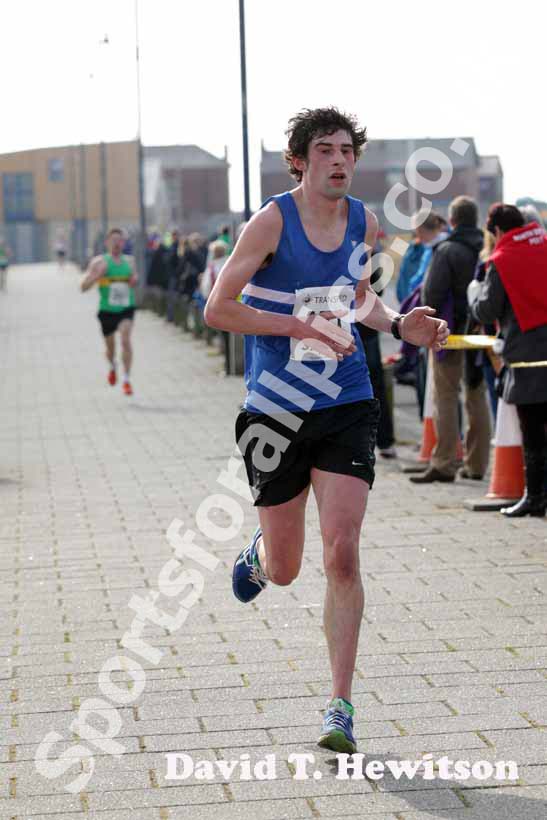 Thomas Straughan (Morpeth) finishing the Transped Blyth Valley 10k.